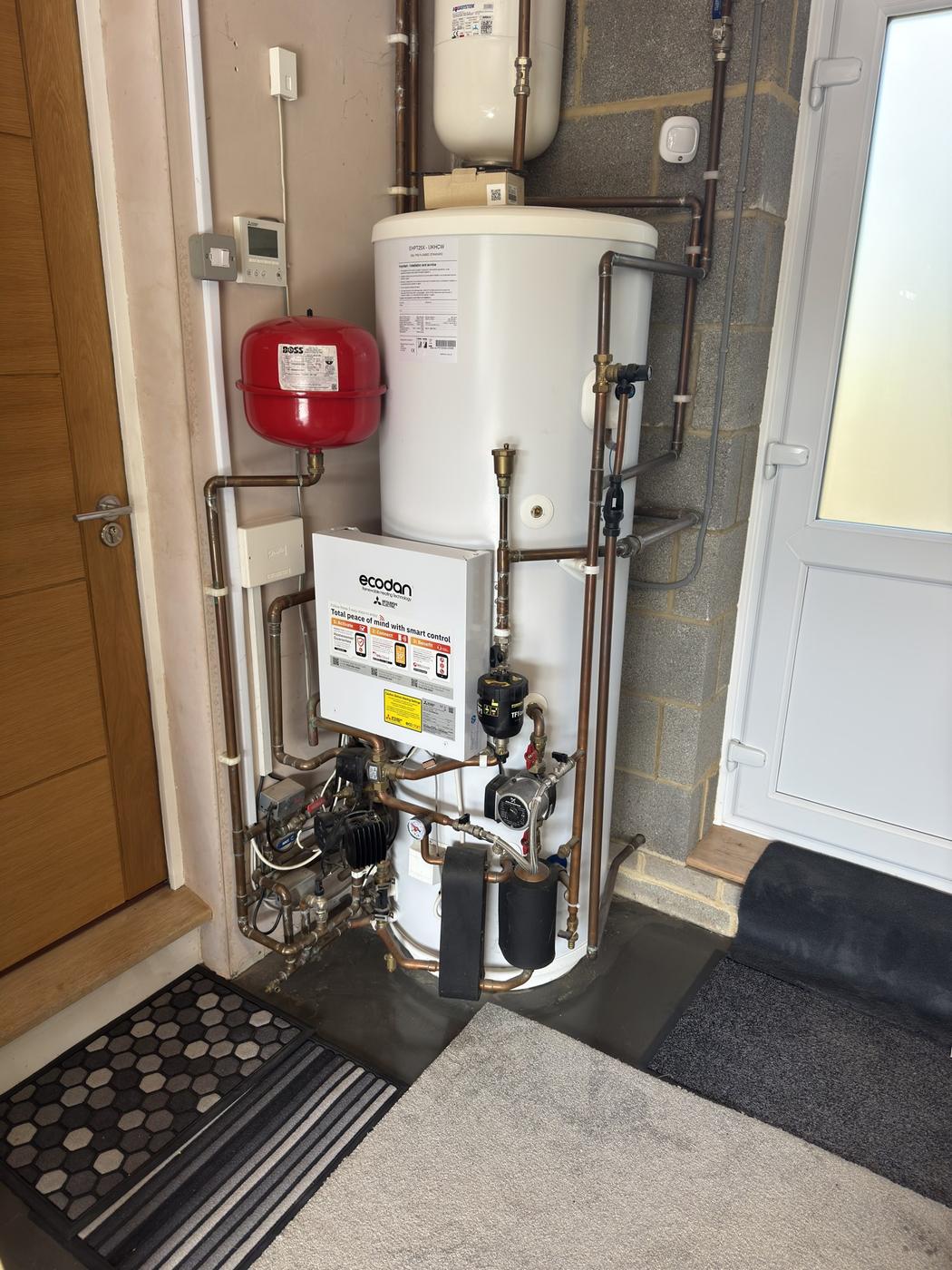 Pre-plumbed cylinder and pipework checked over during an annual service