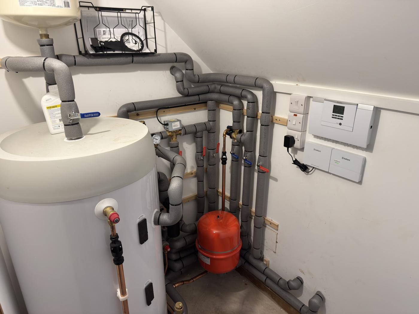 Cylinder, expansion vessel and pipework in a plant cupboard, checked at every service