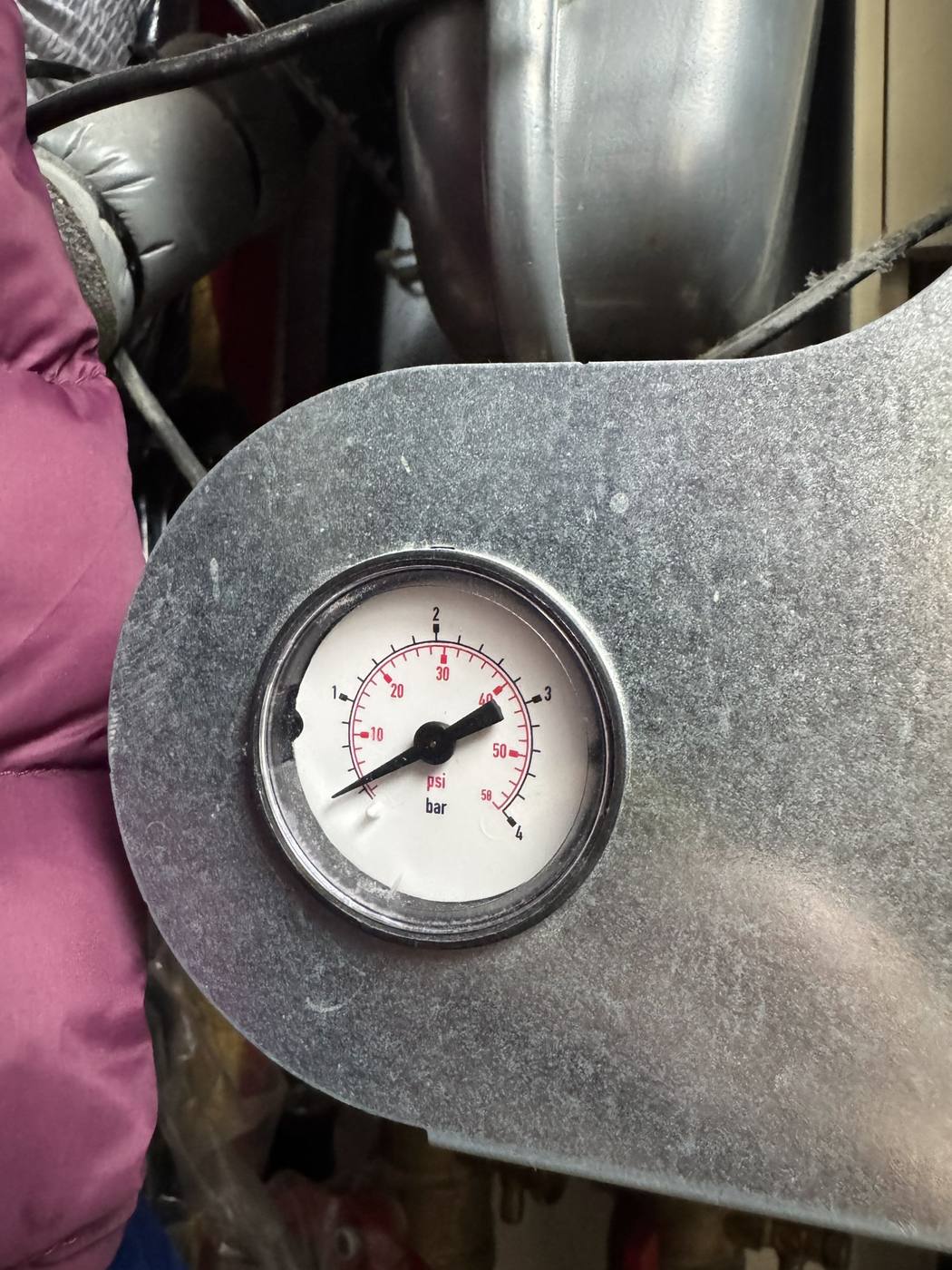 System pressure gauge read and recorded after a service